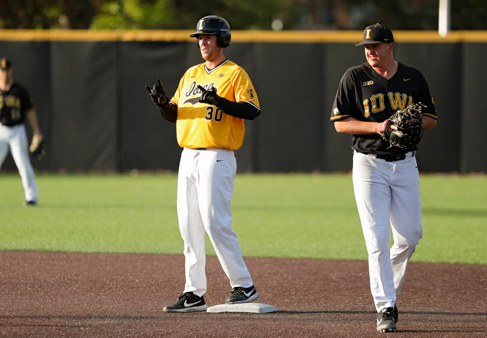 Iowa outfielder Connor McCaffery (30) celebrates after hitting a 2-run double during the fourth inning of the first game of the Black and Gold Fall World Series at Duane Banks Field in Iowa City on Tuesday, Oct 15, 2019. (Stephen Mally/hawkeyesports.com)