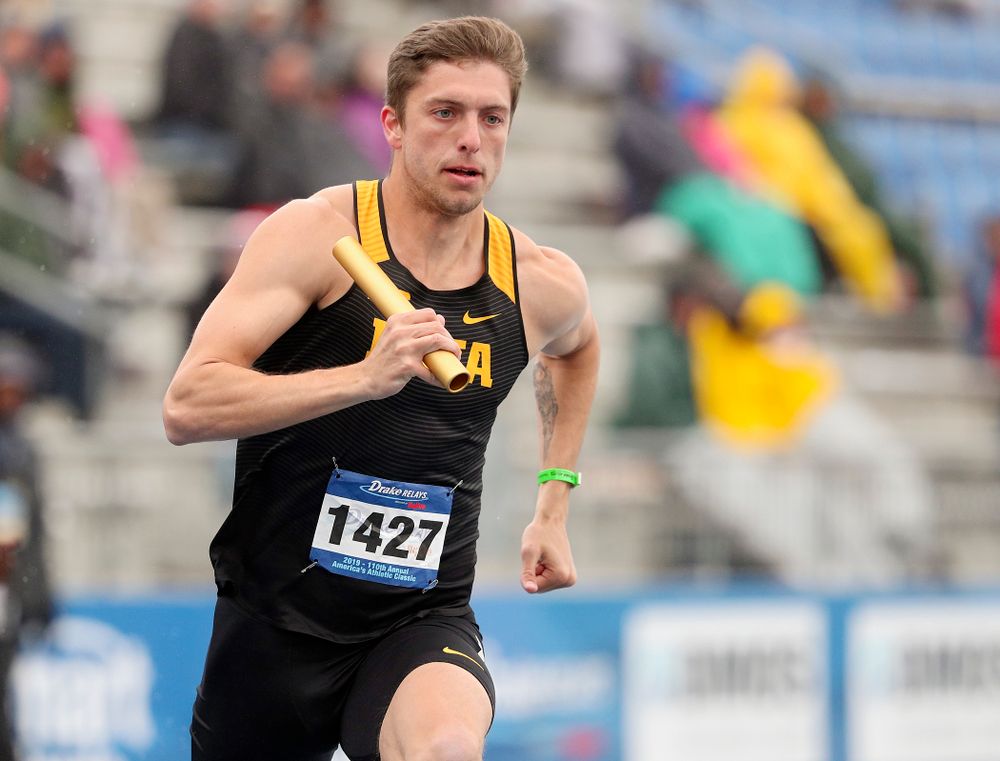 Iowa's Noah Larrison runs the men's 1600 meter relay event during the third day of the Drake Relays at Drake Stadium in Des Moines on Saturday, Apr. 27, 2019. (Stephen Mally/hawkeyesports.com)