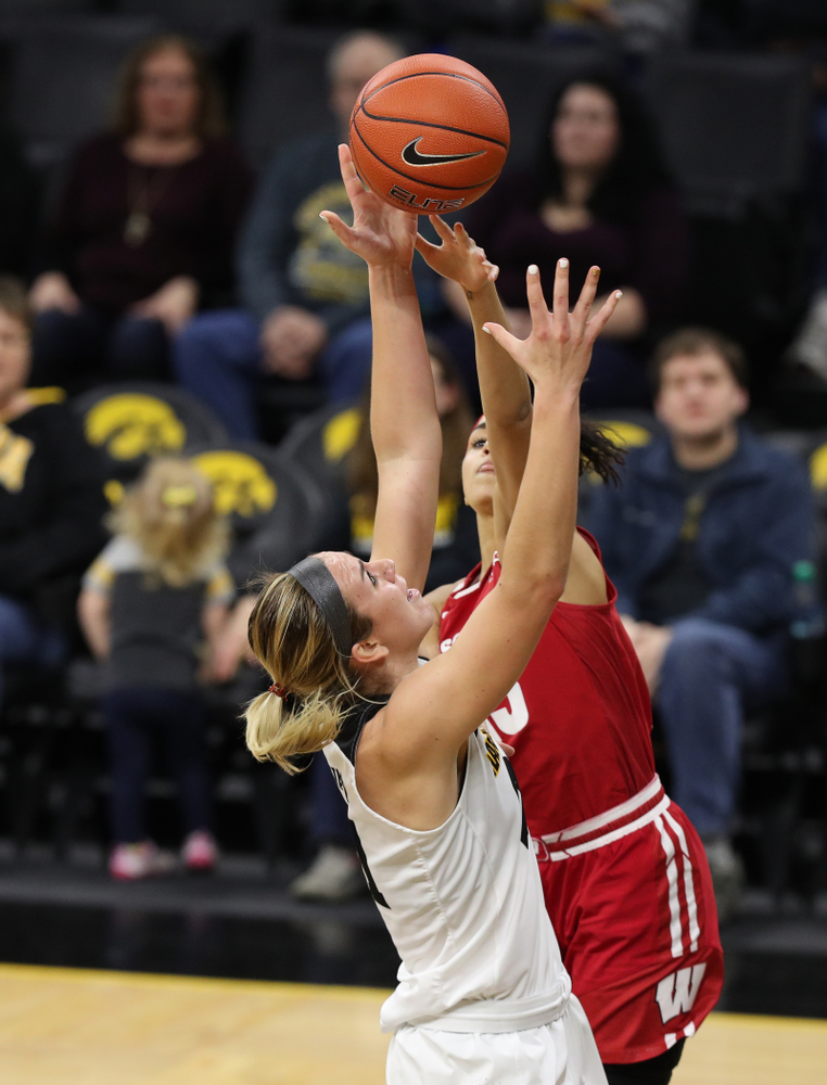 Iowa Hawkeyes forward Hannah Stewart (21) against the Wisconsin Badgers Monday, January 7, 2019 at Carver-Hawkeye Arena. (Brian Ray/hawkeyesports.com)