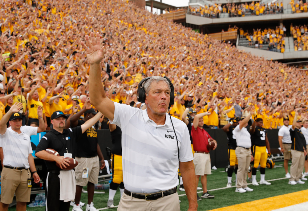 Iowa Hawkeyes head coach Kirk Ferentz waves to the Stead Family Children's Hospital during their game against the Northern Illinois Huskies Saturday, September 1, 2018 at Kinnick Stadium. (Brian Ray/hawkeyesports.com)