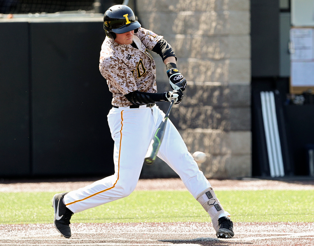 Iowa Hawkeyes third baseman Brendan Sher (2) drives a pitch for a hit during the seventh inning of their game against UC Irvine at Duane Banks Field in Iowa City on Sunday, May. 5, 2019. (Stephen Mally/hawkeyesports.com)