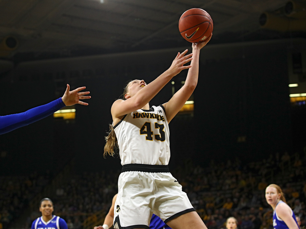 Iowa Hawkeyes forward Amanda Ollinger (43) makes a basket during the first quarter of their game at Carver-Hawkeye Arena in Iowa City on Saturday, December 21, 2019. (Stephen Mally/hawkeyesports.com)
