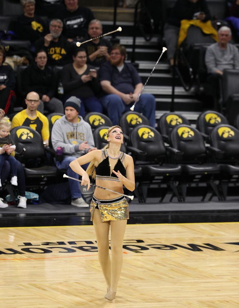 Hawkeye Marching Band Golden Girl Kylene Spanbauer against the Michigan Wolverines Thursday, January 17, 2019 at Carver-Hawkeye Arena. (Brian Ray/hawkeyesports.com)