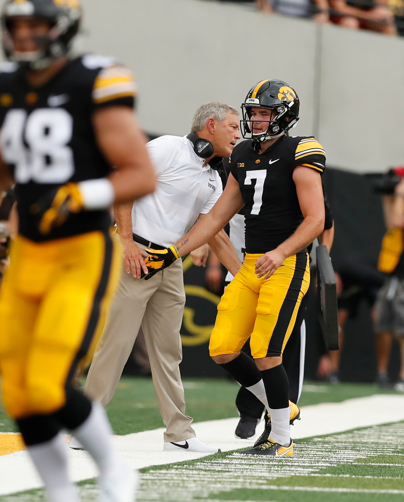 Iowa Hawkeyes punter Colten Rastetter (7) and head coach Kirk Ferentz against the Northern Illinois Huskies Saturday, September 1, 2018 at Kinnick Stadium. (Brian Ray/hawkeyesports.com)