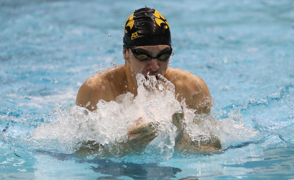 Iowa's Weston Credit competes in the 200-yard breaststroke during a meet against Michigan and Denver at the Campus Recreation and Wellness Center on November 3, 2018. (Tork Mason/hawkeyesports.com)