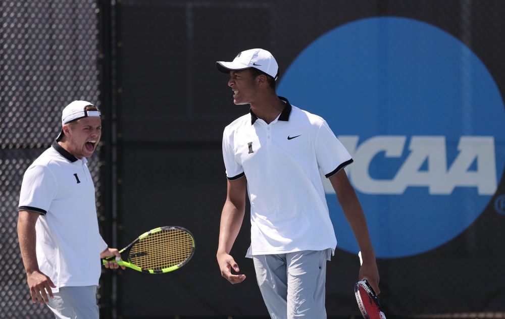IowaÕs Oliver Okonkwo and Will Davies play a doubles match against the Michigan Wolverines Sunday, April 21, 2019 at the Hawkeye Tennis and Recreation Complex. (Brian Ray/hawkeyesports.com)