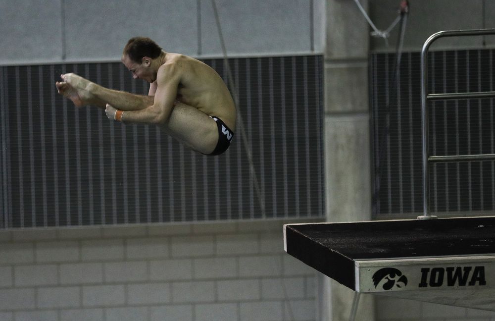 Iowa's Anton Hoherz competes in the platform diving competition during the third day of the Hawkeye Invitational at the Campus Recreation and Wellness Center on November 17, 2018. (Tork Mason/hawkeyesports.com)