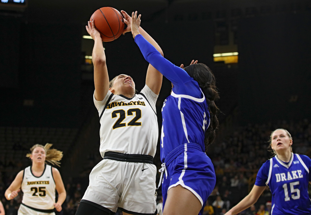 Iowa Hawkeyes guard Kathleen Doyle (22) makes a basket during the first quarter of their game at Carver-Hawkeye Arena in Iowa City on Saturday, December 21, 2019. (Stephen Mally/hawkeyesports.com)