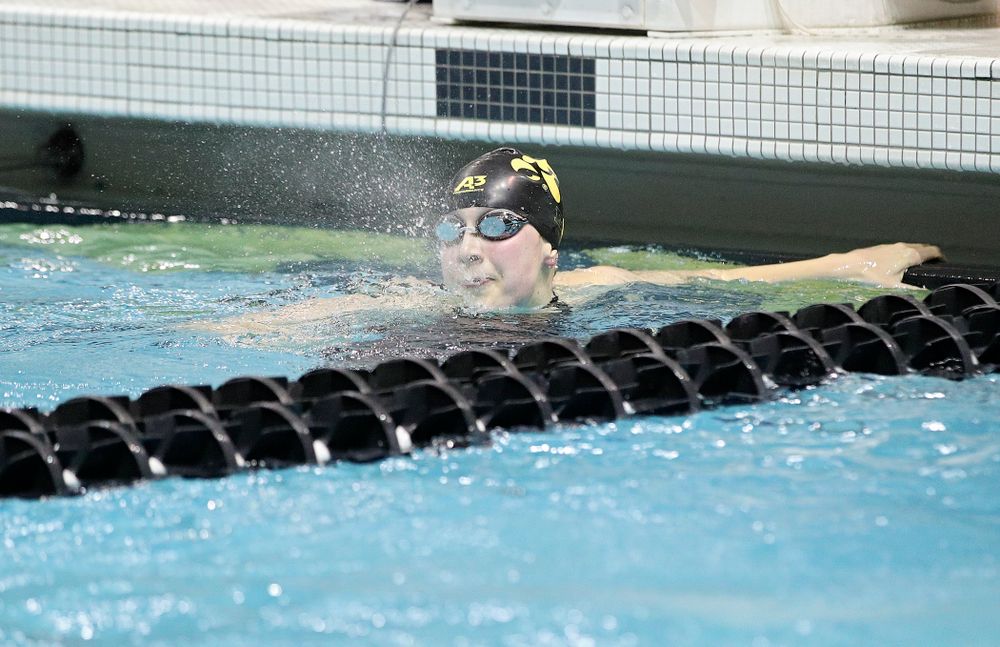Iowa’s Hannah Burvill blows water out of her mouth after swimming the women’s 200 yard freestyle final event during the 2020 Women’s Big Ten Swimming and Diving Championships at the Campus Recreation and Wellness Center in Iowa City on Friday, February 21, 2020. (Stephen Mally/hawkeyesports.com)