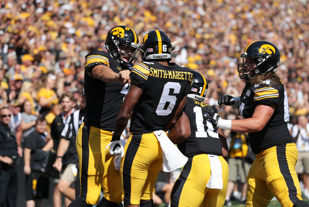 Iowa Hawkeyes wide receiver Ihmir Smith-Marsette (6) scores a touchdown against the Rutgers Scarlet Knights Saturday, September 7, 2019 at Kinnick Stadium. (Brian Ray/hawkeyesports.com)