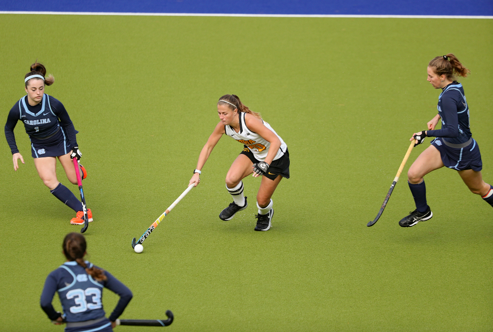 Iowa’s Sophie Sunderland (20) moves with the ball during the third quarter of their NCAA Tournament Second Round match against North Carolina at Karen Shelton Stadium in Chapel Hill, N.C. on Sunday, Nov 17, 2019. (Stephen Mally/hawkeyesports.com)
