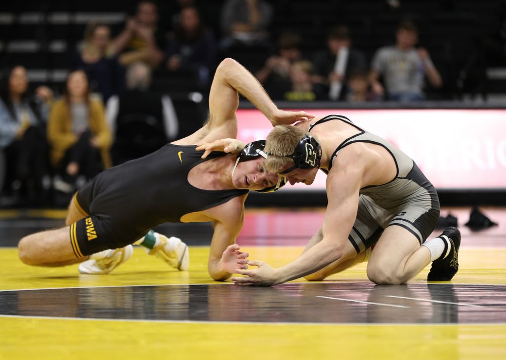 Iowa's Carter Happel wrestles Purdue's Parker Filius at 149 pounds Saturday, November 24, 2018 at Carver-Hawkeye Arena. (Brian Ray/hawkeyesports.com)