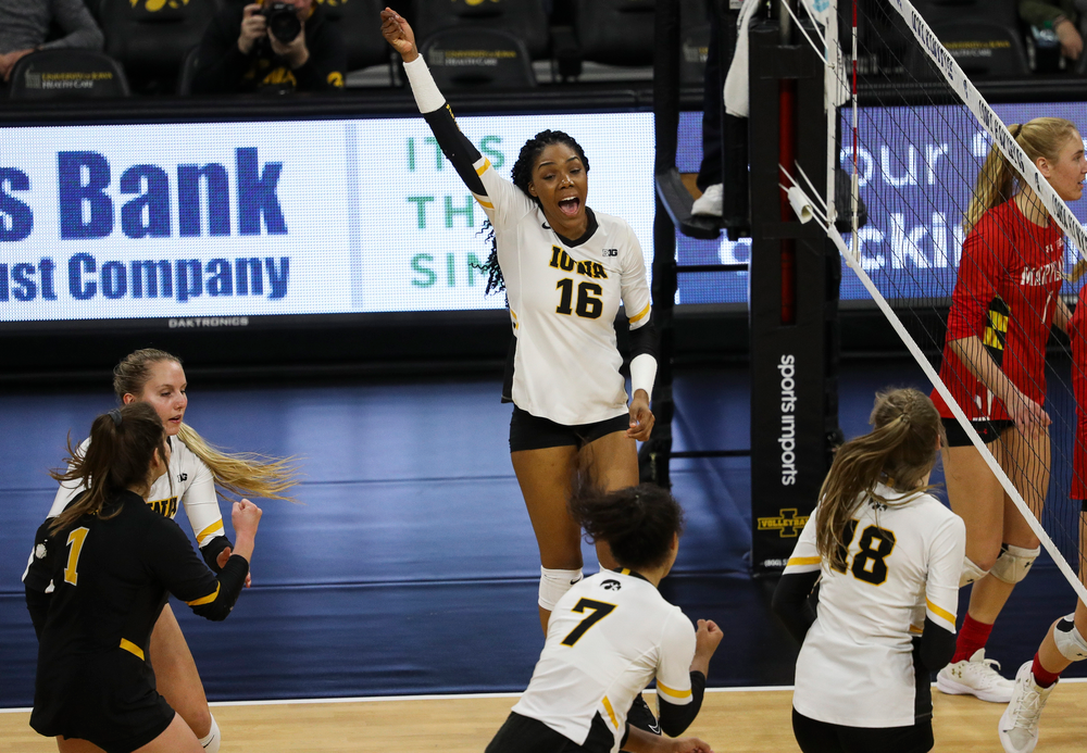 Iowa Hawkeyes outside hitter Taylor Louis (16) celebrates after winning a point during a match against Maryland at Carver-Hawkeye Arena on November 23, 2018. (Tork Mason/hawkeyesports.com)