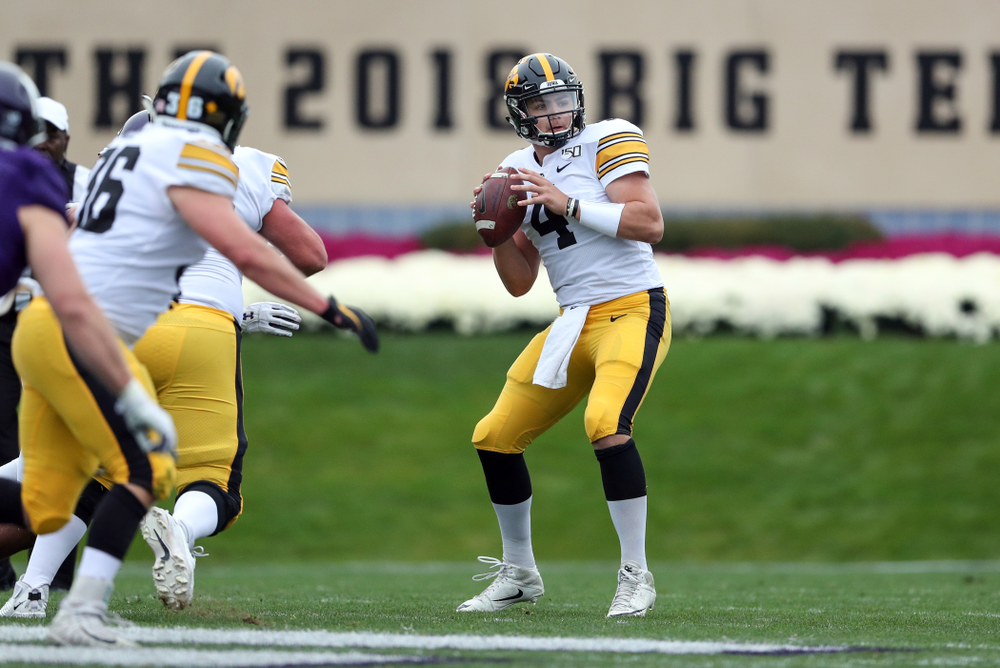 Iowa Hawkeyes quarterback Nate Stanley (4) against the Northwestern Wildcats Saturday, October 26, 2019 at Ryan Field in Evanston, Ill. (Brian Ray/hawkeyesports.com)
