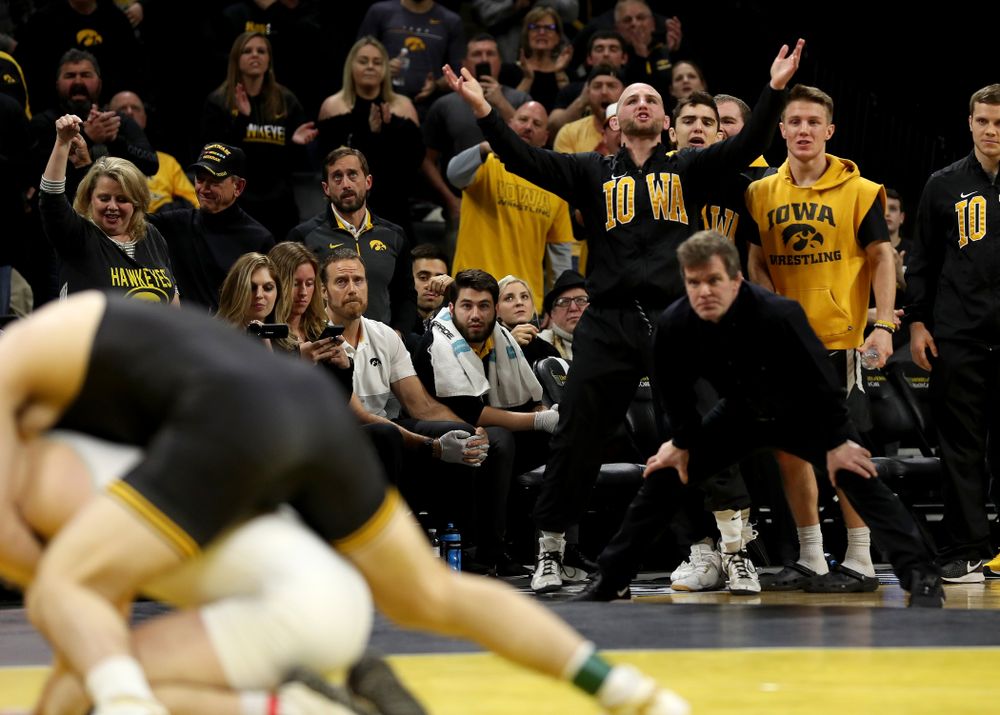 Alex Marinelli cheers as Iowa’s Abe Assad wrestles Ohio State’s Rockey Jordan at 184 pounds Friday, January 24, 2020 at Carver-Hawkeye Arena. Assad won the match 3-1. (Brian Ray/hawkeyesports.com)