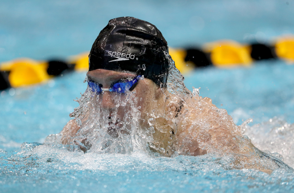 IowaÕs Sage Ohlensehlen competes in the 100 yard breaststroke against Notre Dame and Illinois Saturday, January 11, 2020 at the Campus Recreation and Wellness Center. (Brian Ray/hawkeyesports.com)