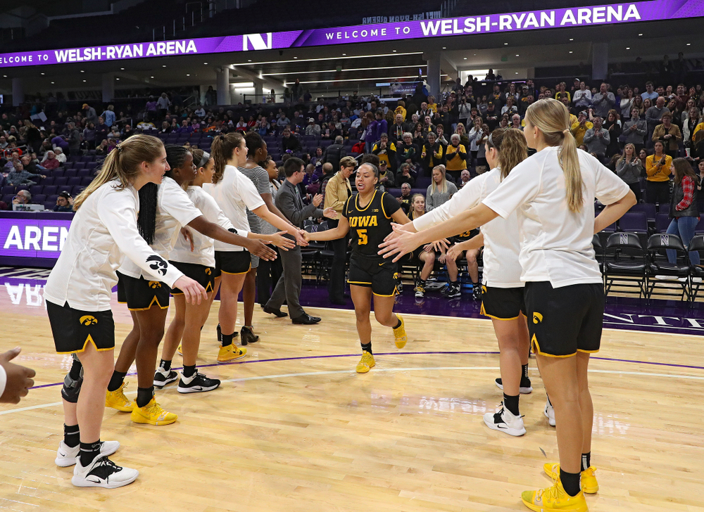 Iowa Hawkeyes guard Alexis Sevillian (5) is introduced before their game at Welsh-Ryan Arena in Evanston, Ill. on Sunday, January 5, 2020. (Stephen Mally/hawkeyesports.com)