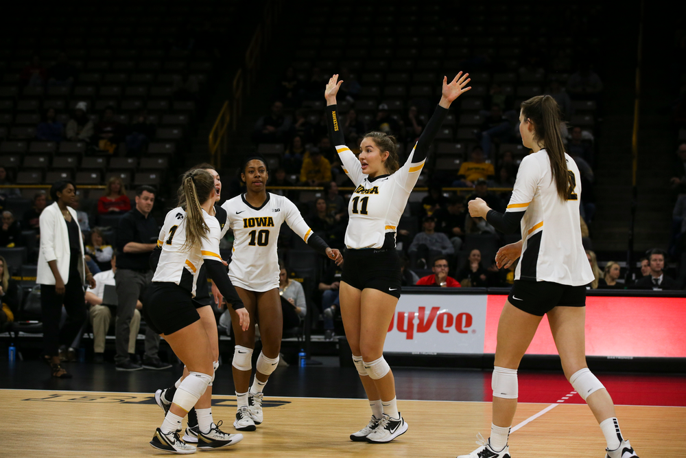 Iowa Hawkeyes outside hitter Griere Hughes (10) and Iowa Hawkeyes middle blocker Blythe Rients (11) during Iowa volleyball vs Maryland on Saturday, November 30, 2019 at Carver-Hawkeye Arena. (Lily Smith/hawkeyesports.com)
