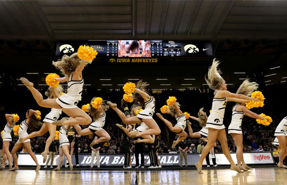 The Iowa Cheerleaders and Dance Team perform on senior night at half-time of the Iowa Hawkeyes game against the Purdue Boilermakers Tuesday, March 3, 2020 at Carver-Hawkeye Arena. (Brian Ray/hawkeyesports.com)