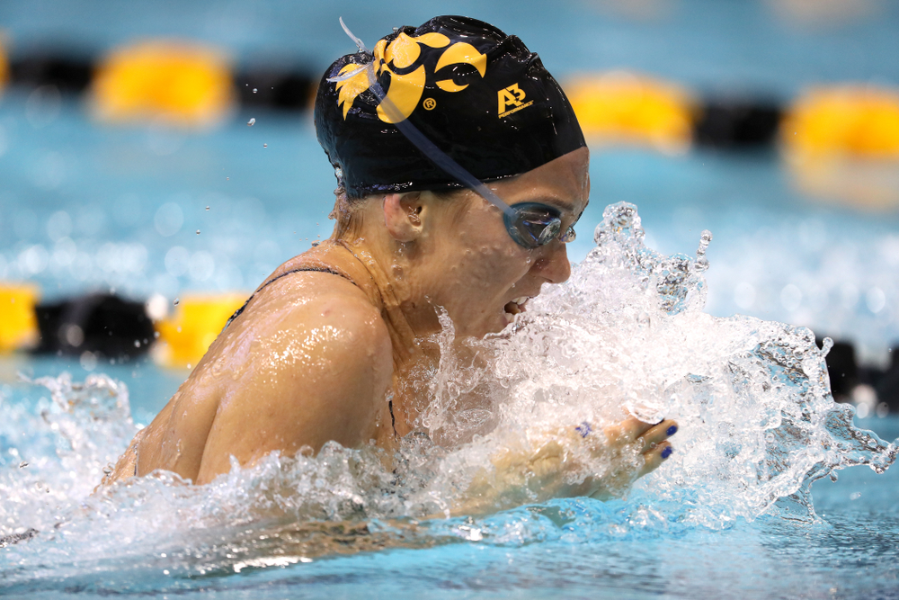Iowa's Devin Jacobs swims the 100 yard breaststroke during a double dual against Wisconsin and Northwestern Saturday, January 19, 2019 at the Campus Recreation and Wellness Center. (Brian Ray/hawkeyesports.com)
