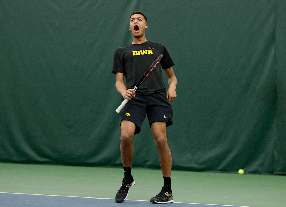 Iowa’s Oliver Okonkwo celebrates during his doubles match at the Hawkeye Tennis and Recreation Complex in Iowa City on Thursday, January 16, 2020. (Stephen Mally/hawkeyesports.com)