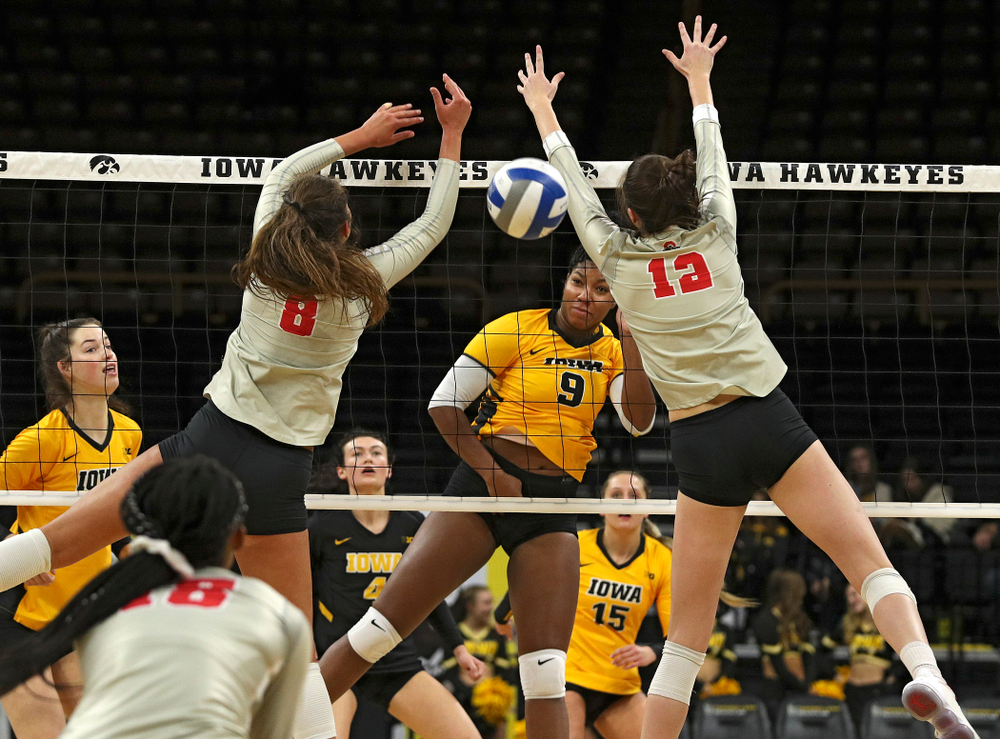 Iowa’s Amiya Jones (9) gets a kill during the first set of their match at Carver-Hawkeye Arena in Iowa City on Friday, Nov 29, 2019. (Stephen Mally/hawkeyesports.com)