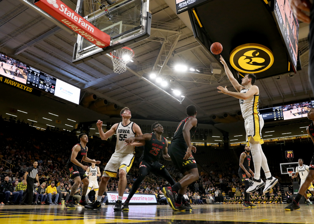 Iowa Hawkeyes forward Ryan Kriener (15) puts up a shot against the Maryland Terrapins Friday, January 10, 2020 at Carver-Hawkeye Arena. (Brian Ray/hawkeyesports.com)