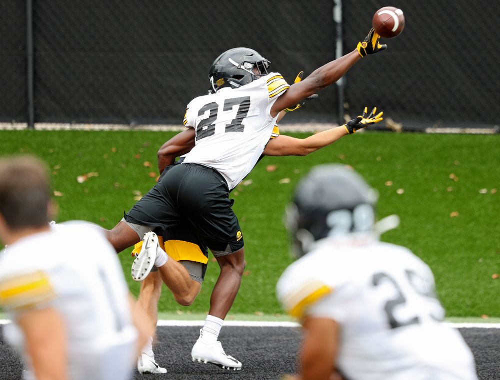 Iowa Hawkeyes defensive back Jermari Harris (27) knocks a pass away intended for wide receiver Calvin Lockett (82) during Fall Camp Practice No. 15 at the Hansen Football Performance Center in Iowa City on Monday, Aug 19, 2019. (Stephen Mally/hawkeyesports.com)