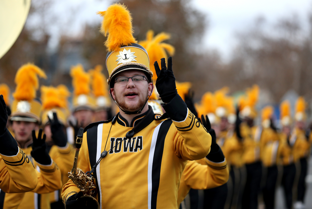 The Hawkeye Marching Band and the Iowa Spirit Squad march in the Holiday Bowl Parade Thursday, December 26, 2019 in San Diego. (Brian Ray/hawkeyesports.com)