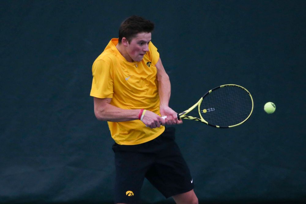 Iowa's Piotr Smietana at a tennis match vs Drake Friday, March 8, 2019 at the Hawkeye Tennis and Recreation Complex. (Lily Smith/hawkeyesports.com)