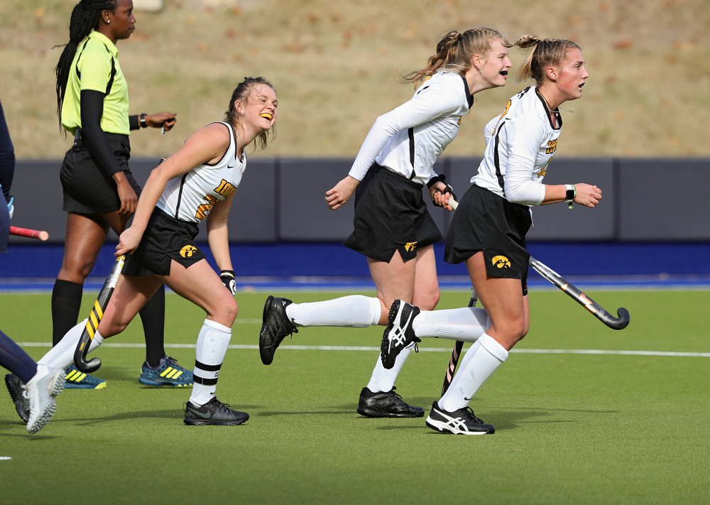 Iowa’s Maddy Murphy (26), Sofie Stribos (9), and Leah Zellner (13) celebrate after Stribos’ goal during the second quarter of their NCAA Tournament Second Round match against North Carolina at Karen Shelton Stadium in Chapel Hill, N.C. on Sunday, Nov 17, 2019. (Stephen Mally/hawkeyesports.com)