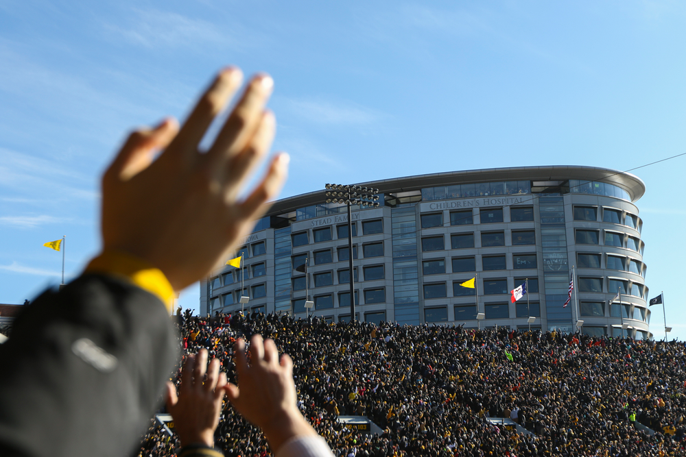 Iowa fans participate in The Wave during Iowa football vs Illinois on Saturday, November 23, 2019 at Kinnick Stadium. (Lily Smith/hawkeyesports.com)