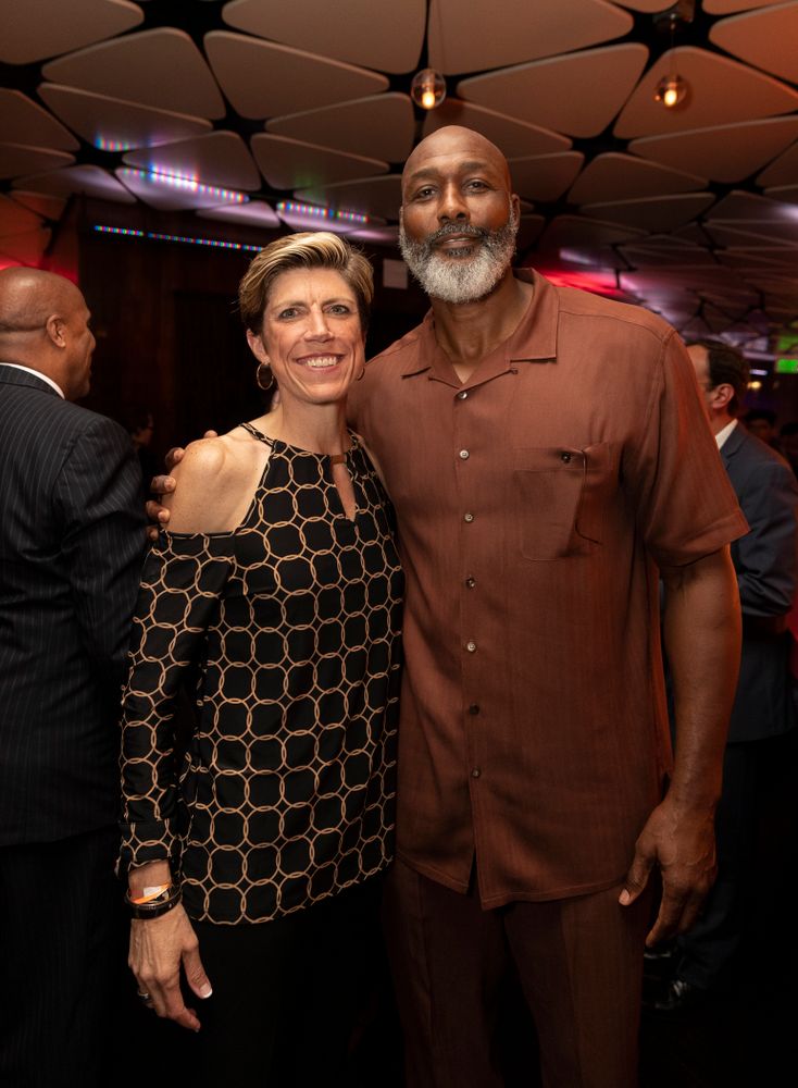 Iowa Hawkeyes associate head coach Jan Jensen with NBA great Karl Malone before the ESPN College Basketball Awards show Friday, April 12, 2019 at The Novo at LA Live. (Brian Ray/hawkeyesports.com)