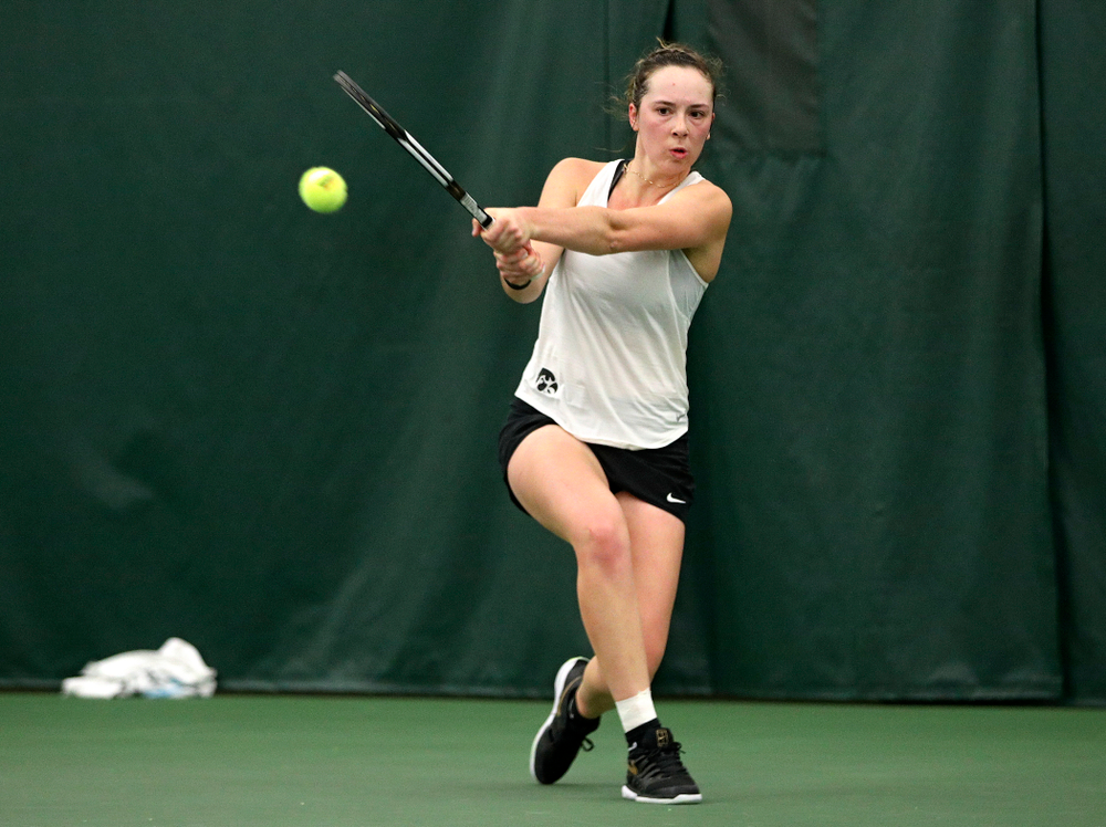 Iowa’s Samantha Mannix returns a shot during her singles match at the Hawkeye Tennis and Recreation Complex in Iowa City on Sunday, February 23, 2020. (Stephen Mally/hawkeyesports.com)
