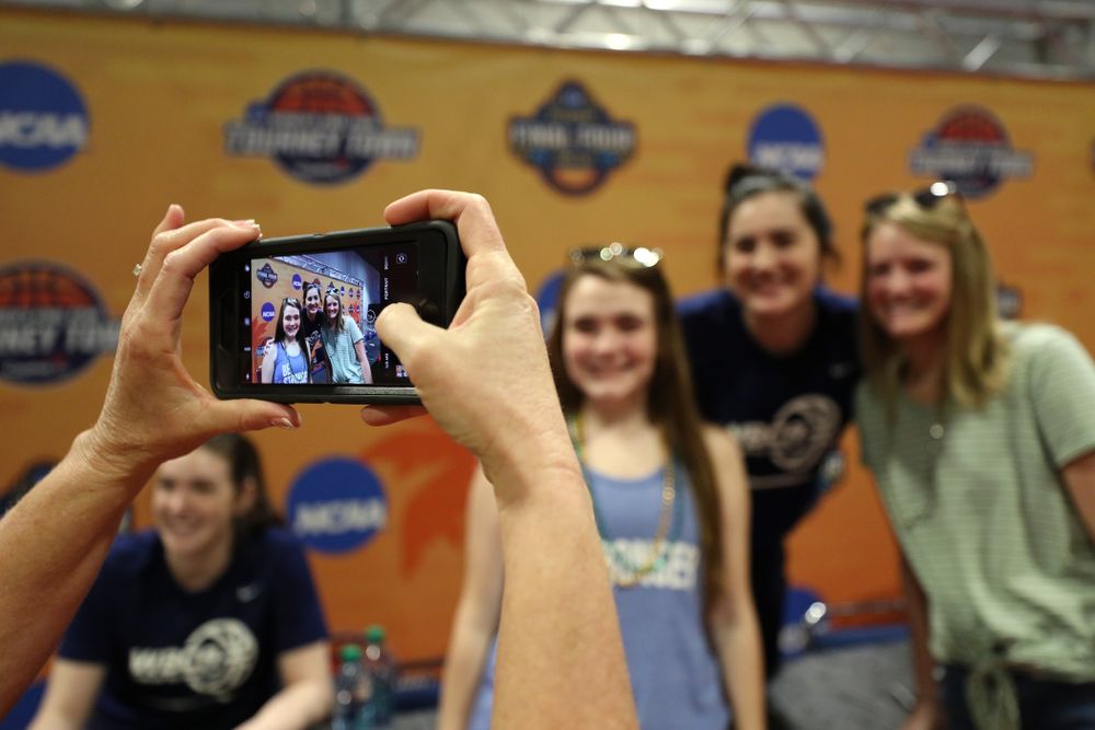 Iowa Hawkeyes forward Megan Gustafson (10) signs autographs with the other WBCA All Americans at the Tourney Town Fan Fest Friday, April 5, 2019 at the Tampa Convention Center in Tampa, FL. (Brian Ray/hawkeyesports.com)