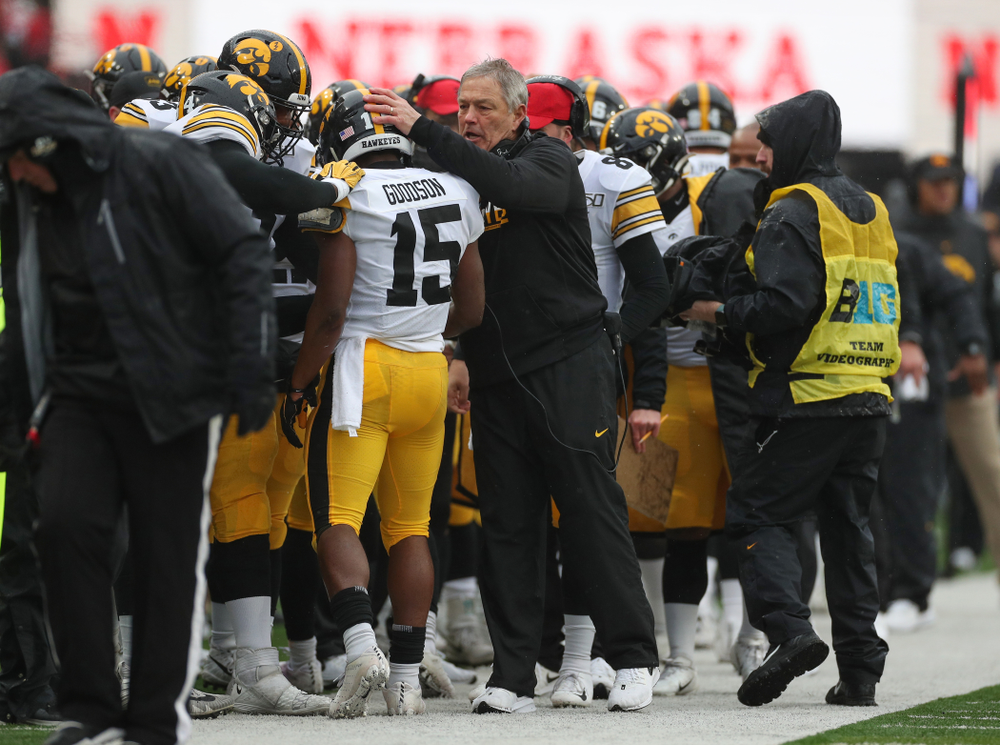 Iowa Hawkeyes running back Tyler Goodson (15) is congratulated by head coach Kirk Ferentz after scoring against the Nebraska Cornhuskers Friday, November 29, 2019 at Memorial Stadium in Lincoln, Neb. (Brian Ray/hawkeyesports.com)
