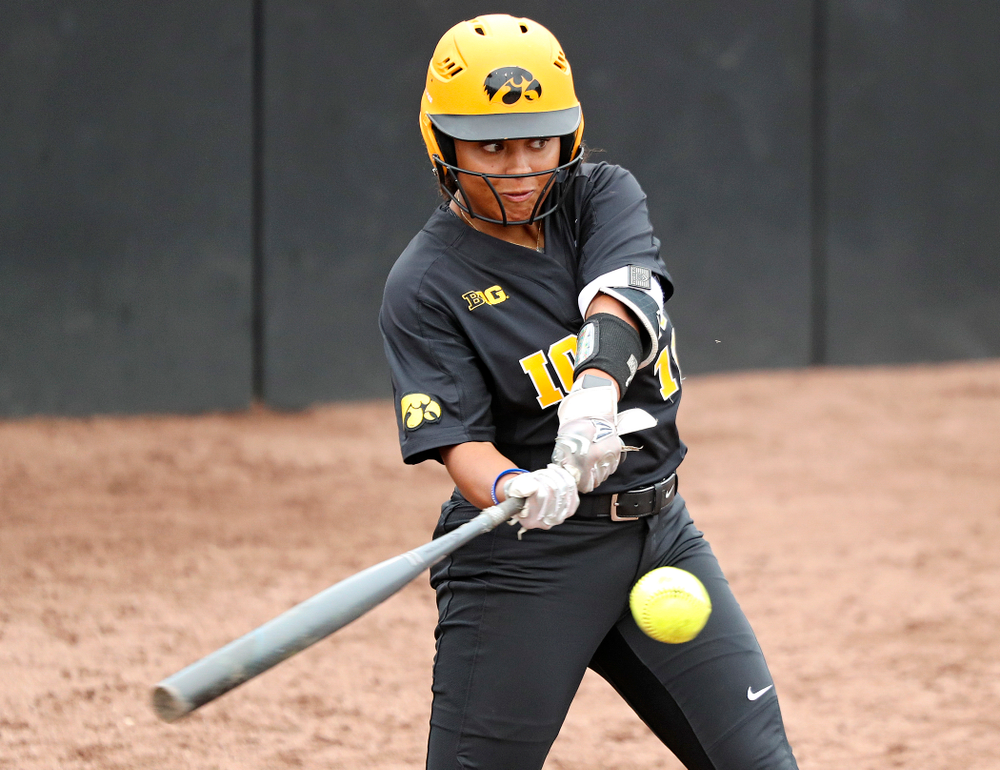 Iowa infielder Avery Guy (11) bats during the sixth inning of their game against Iowa Softball vs Indian Hills Community College at Pearl Field in Iowa City on Sunday, Oct 6, 2019. (Stephen Mally/hawkeyesports.com)