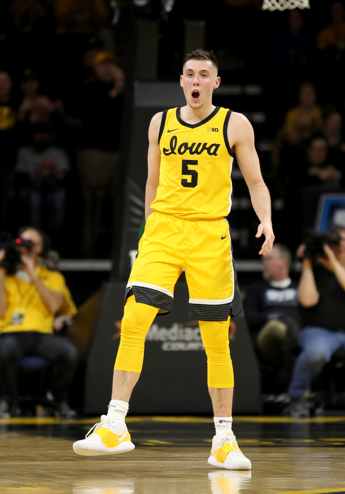 Iowa Hawkeyes guard CJ Fredrick (5) celebrates a three point basket against the Rutgers Scarlet Knights Wednesday, January 22, 2020 at Carver-Hawkeye Arena. (Brian Ray/hawkeyesports.com)