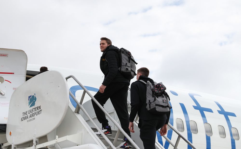 Iowa Hawkeyes forward Riley Till (20) boards a flight to Columbus for the first and second rounds of the 2019 NCAA Men's Basketball Tournament Wednesday, March 20, 2019 at the Eastern Iowa Airport. (Brian Ray/hawkeyesports.com)