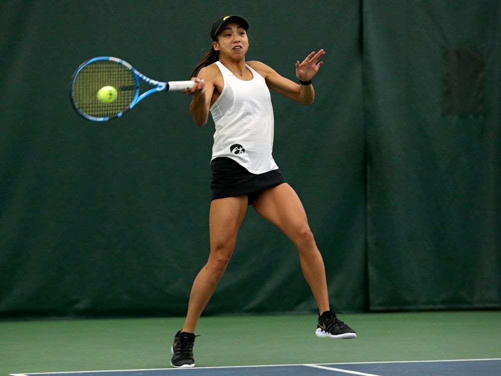 Iowa’s Michelle Bacalla returns a shot during her doubles match at the Hawkeye Tennis and Recreation Complex in Iowa City on Sunday, February 23, 2020. (Stephen Mally/hawkeyesports.com)