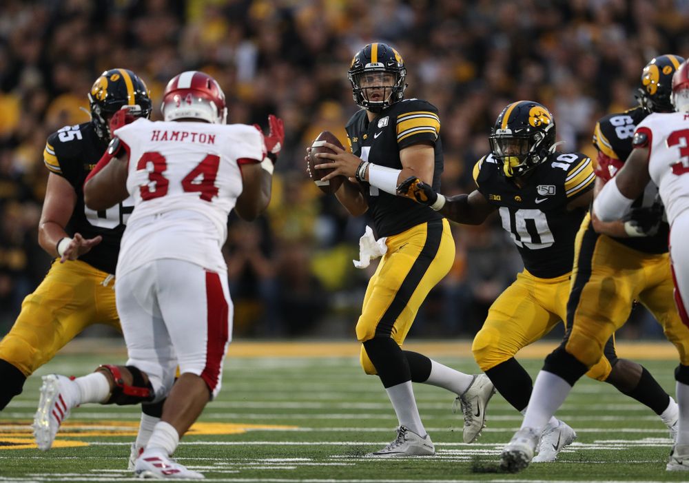 Iowa Hawkeyes quarterback Nate Stanley (4) against the Miami RedHawks Saturday, August 31, 2019 at Kinnick Stadium in Iowa City. (Brian Ray/hawkeyesports.com)
