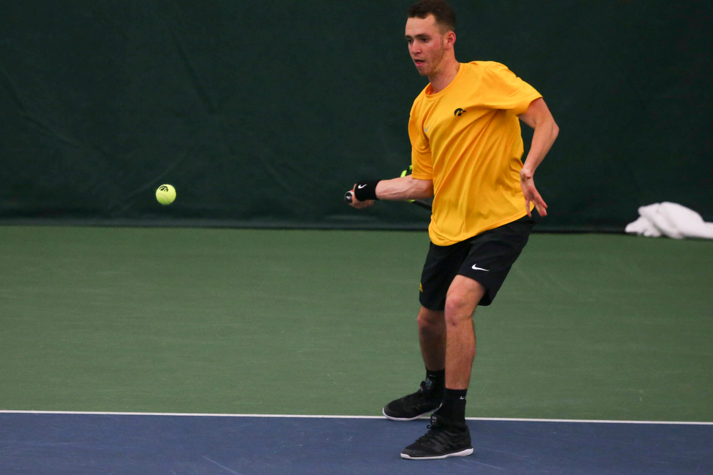 Iowa's Kareem Allaf at a tennis match vs Drake Friday, March 8, 2019 at the Hawkeye Tennis and Recreation Complex. (Lily Smith/hawkeyesports.com)
