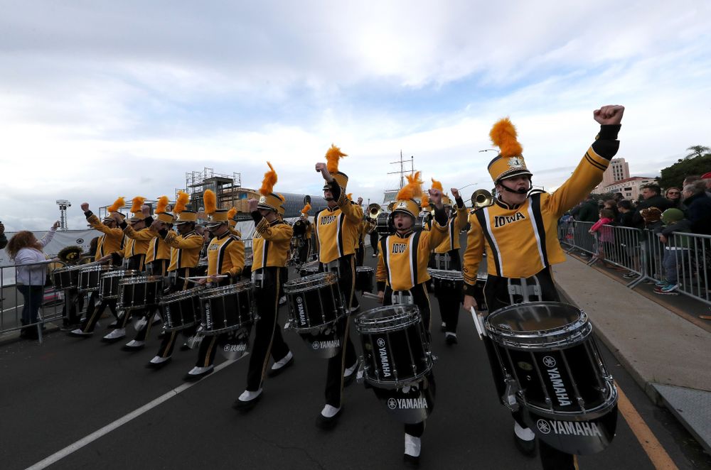 The Hawkeye Marching Band and the Iowa Spirit Squad march in the Holiday Bowl Parade Thursday, December 26, 2019 in San Diego. (Brian Ray/hawkeyesports.com)