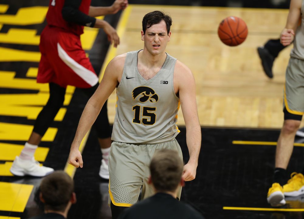 Iowa Hawkeyes forward Ryan Kriener (15) flexes after making a basket and drawing a foul against the Nebraska Cornhuskers Sunday, January 6, 2019 at Carver-Hawkeye Arena. (Brian Ray/hawkeyesports.com)