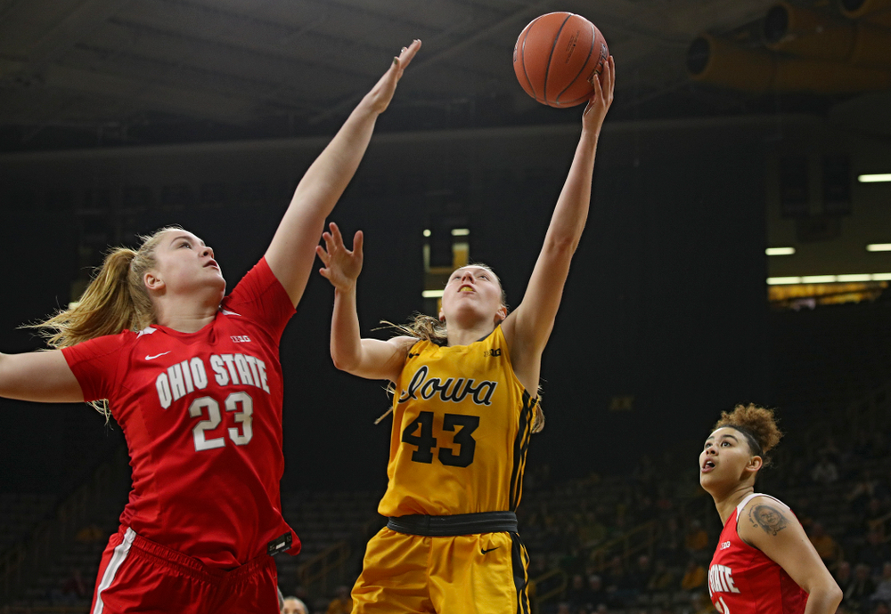 Iowa Hawkeyes forward Amanda Ollinger (43) makes a basket during the first quarter of their game at Carver-Hawkeye Arena in Iowa City on Thursday, January 23, 2020. (Stephen Mally/hawkeyesports.com)