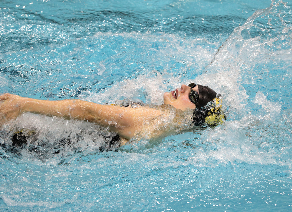 Iowa's Hannah Burvill swims the 100-yard backstroke against the Iowa State Cyclones in the Iowa Corn Cy-Hawk Series Friday, December 7, 2018 at at the Campus Recreation and Wellness Center. (Brian Ray/hawkeyesports.com)