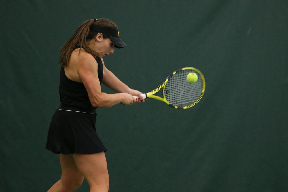 Iowa’s Danielle Bauers returns a ball during the Iowa women’s tennis meet vs UNI on Saturday, February 29, 2020 at the Hawkeye Tennis and Recreation Complex. (Lily Smith/hawkeyesports.com)