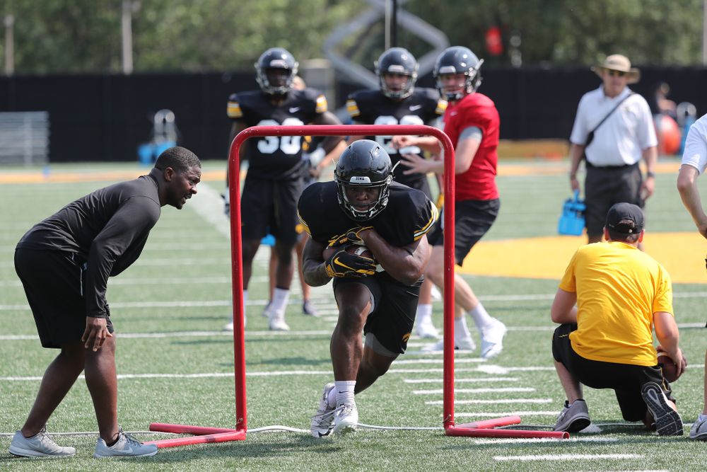 Iowa Hawkeyes running back Mekhi Sargent (10) and running backs coach Derrick Foster during the third practice of fall camp Sunday, August 5, 2018 at the Kenyon Football Practice Facility. (Brian Ray/hawkeyesports.com)