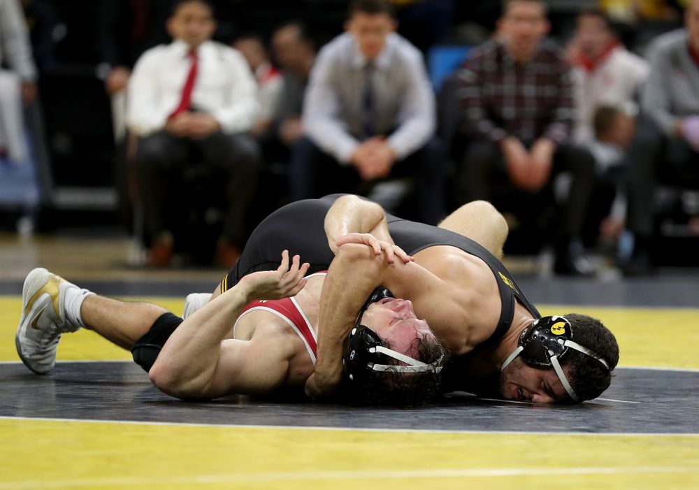 IowaÕs Michael Kemerer wrestles WisconsinÕs Jared Krattinger at 174 pounds Sunday, December 1, 2019 at Carver-Hawkeye Arena. Kemerer won the match with a fall. (Brian Ray/hawkeyesports.com)