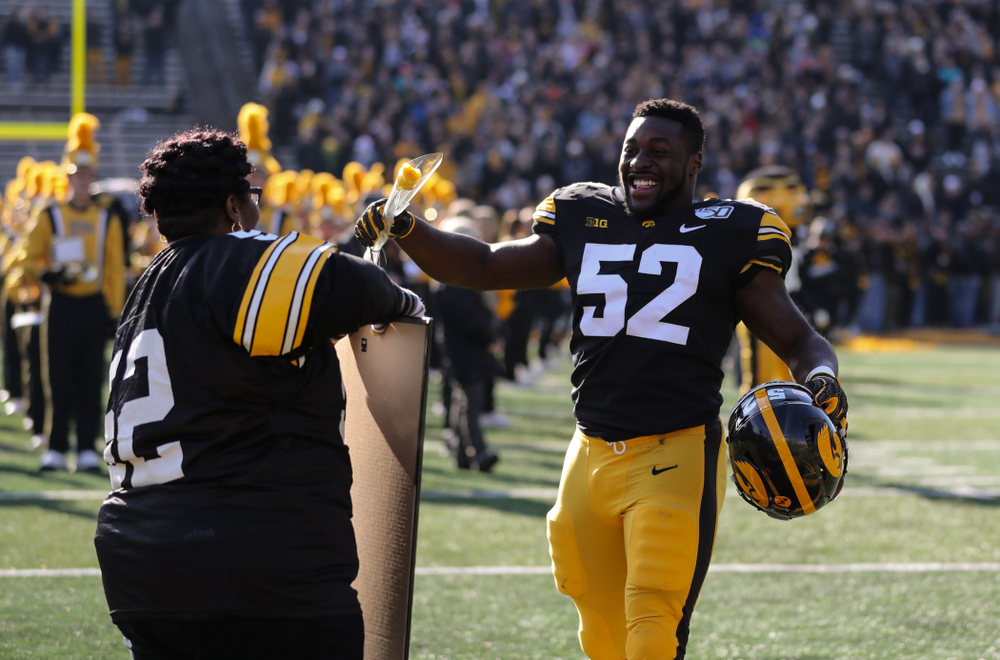 Iowa Hawkeyes linebacker Amani Jones (52) during Senior Day festivities before their game against the Illinois Fighting Illini Saturday, November 23, 2019 at Kinnick Stadium. (Brian Ray/hawkeyesports.com)